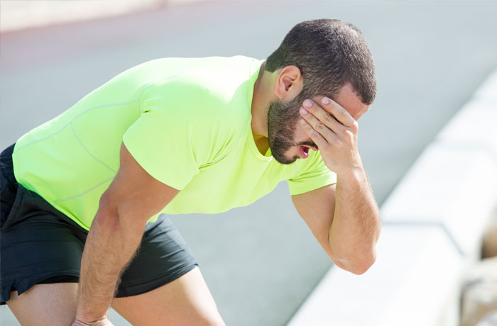 Man suffering from heat stroke